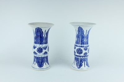 Lot 22 - A pair of Chinese blue and white gu vases,...