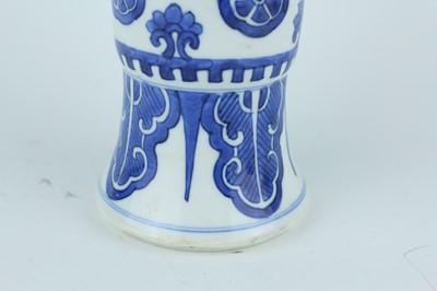 Lot 22 - A pair of Chinese blue and white gu vases,...