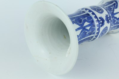 Lot 22 - A pair of Chinese blue and white gu vases,...