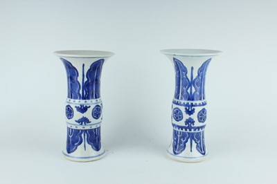 Lot 22 - A pair of Chinese blue and white gu vases,...