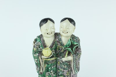 Lot 130 - Two Chinese famille verte figures, Qing...