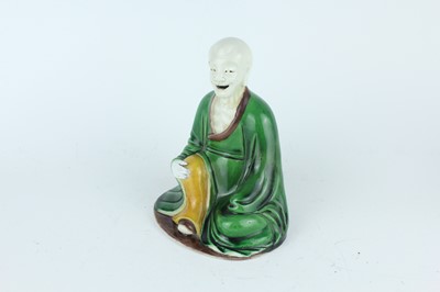 Lot 130 - Two Chinese famille verte figures, Qing...