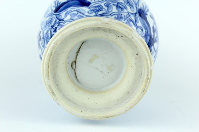 Lot 19 - A Chinese blue and white gourd vase, Qing...