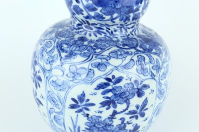 Lot 19 - A Chinese blue and white gourd vase, Qing...