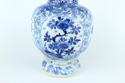 Lot 19 - A Chinese blue and white gourd vase, Qing...