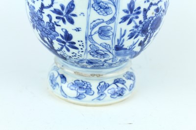 Lot 19 - A Chinese blue and white gourd vase, Qing...