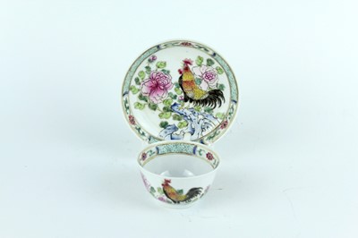 Lot 193 - A Chinese famille rose tea bowl and saucer,...