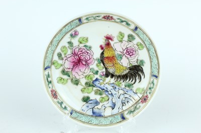 Lot 193 - A Chinese famille rose tea bowl and saucer,...