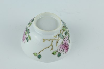 Lot 193 - A Chinese famille rose tea bowl and saucer,...