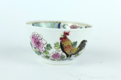 Lot 193 - A Chinese famille rose tea bowl and saucer,...
