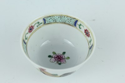 Lot 193 - A Chinese famille rose tea bowl and saucer,...