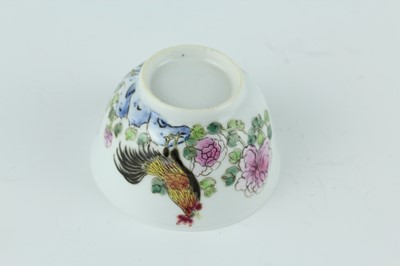Lot 193 - A Chinese famille rose tea bowl and saucer,...