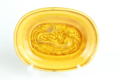 Lot 93 - Three Chinese yellow-glazed ‘dragon’ dishes,...