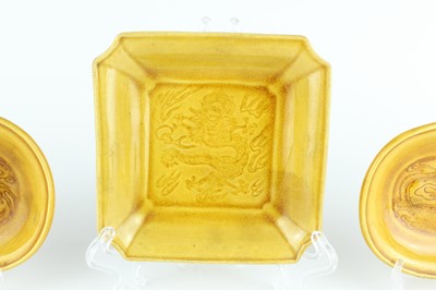 Lot 93 - Three Chinese yellow-glazed ‘dragon’ dishes,...
