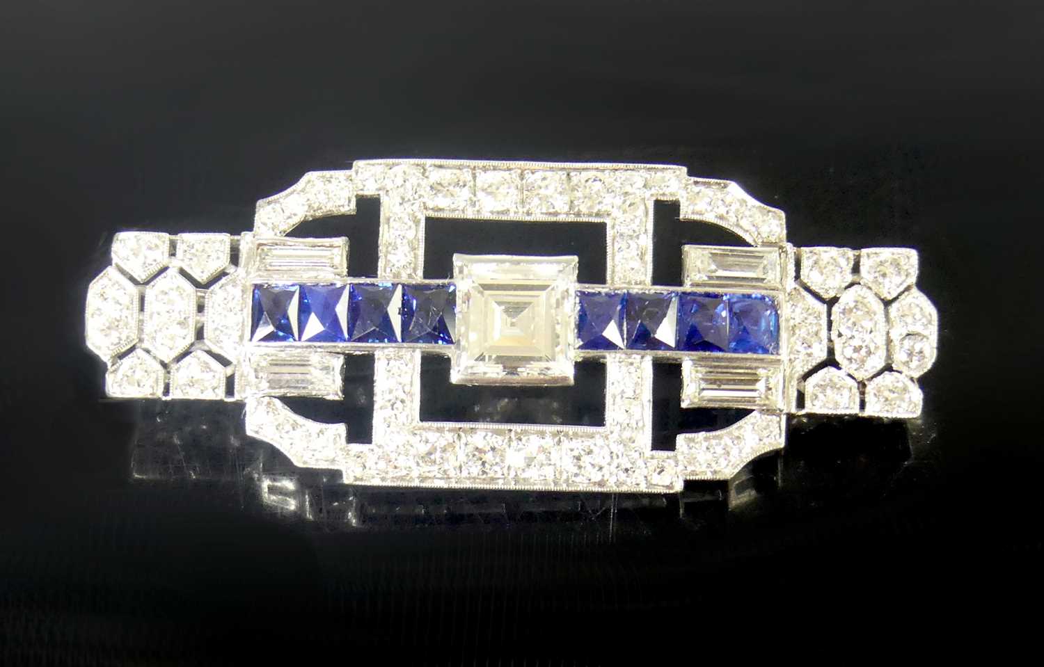 Lot 2508 - An Art Deco white metal, sapphire and diamond...
