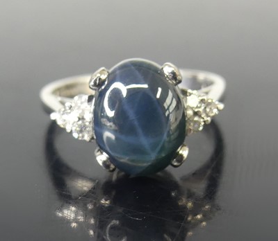 Lot 2510 - An 18ct white gold dress ring, having a centre...