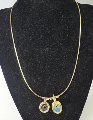 Lot 2547 - An 18ct yellow gold Omega wire with two...