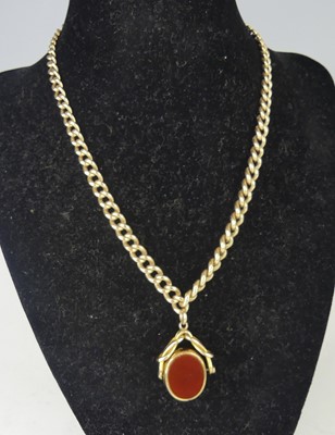 Lot 2538 - A yellow metal graduated curb link watch chain,...