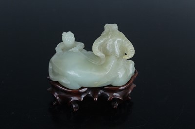 Lot 38 - A Chinese pale celadon jade figure of a water...
