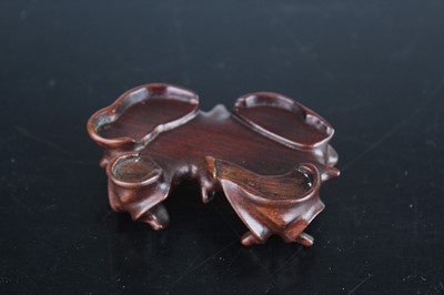 Lot 38 - A Chinese pale celadon jade figure of a water...