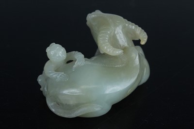 Lot 38 - A Chinese pale celadon jade figure of a water...