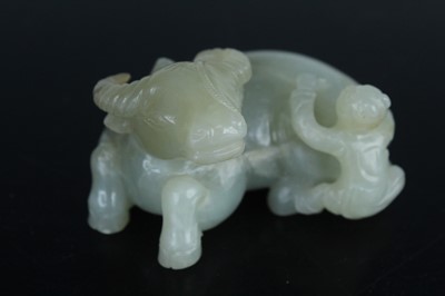 Lot 38 - A Chinese pale celadon jade figure of a water...