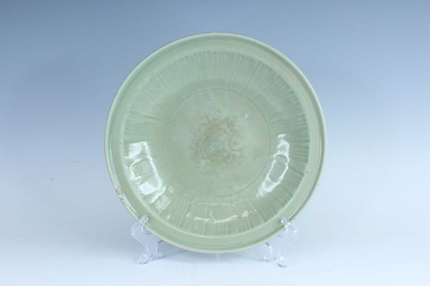 Lot 99 - A Chinese Longquan celadon dish, early Ming...