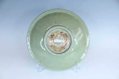 Lot 99 - A Chinese Longquan celadon dish, early Ming...