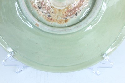 Lot 99 - A Chinese Longquan celadon dish, early Ming...