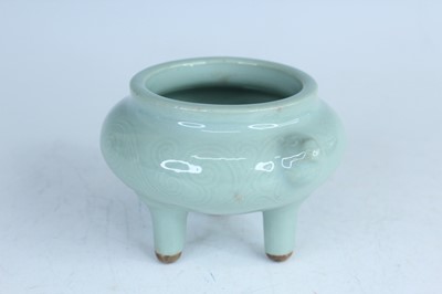 Lot 98 - A Chinese celadon censer and another tripod...