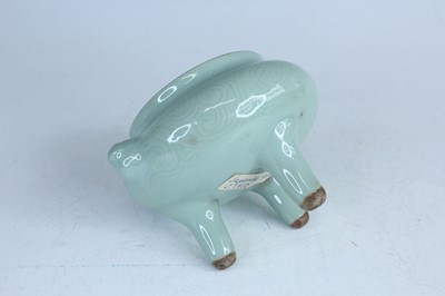 Lot 98 - A Chinese celadon censer and another tripod...