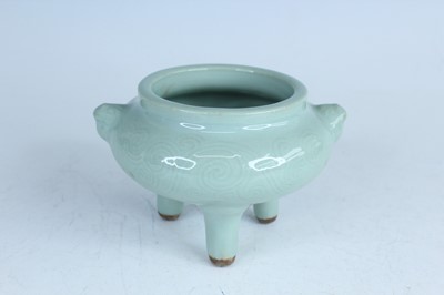 Lot 98 - A Chinese celadon censer and another tripod...