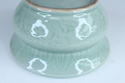 Lot 98 - A Chinese celadon censer and another tripod...