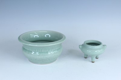 Lot 98 - A Chinese celadon censer and another tripod...