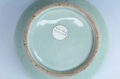 Lot 98 - A Chinese celadon censer and another tripod...