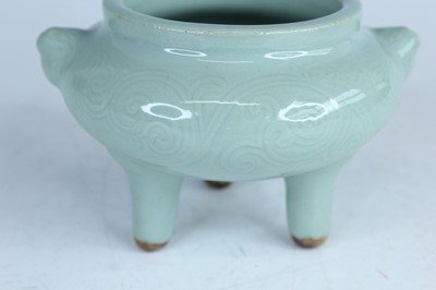 Lot 98 - A Chinese celadon censer and another tripod...