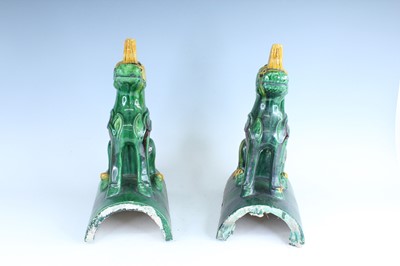 Lot 126 - A pair of Chinese sancai-glazed roof tile...
