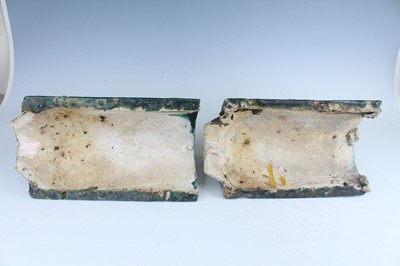 Lot 126 - A pair of Chinese sancai-glazed roof tile...