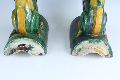 Lot 126 - A pair of Chinese sancai-glazed roof tile...