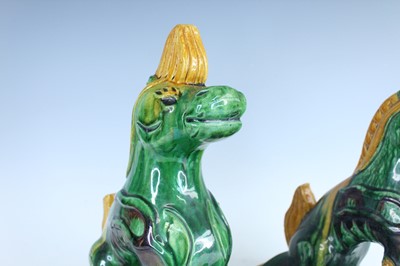 Lot 126 - A pair of Chinese sancai-glazed roof tile...