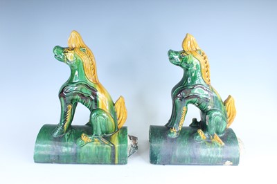 Lot 126 - A pair of Chinese sancai-glazed roof tile...