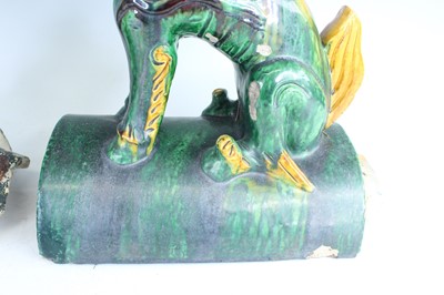 Lot 126 - A pair of Chinese sancai-glazed roof tile...