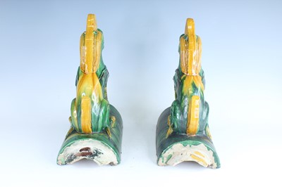 Lot 126 - A pair of Chinese sancai-glazed roof tile...