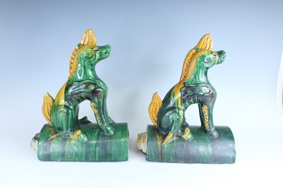 Lot 126 - A pair of Chinese sancai-glazed roof tile...