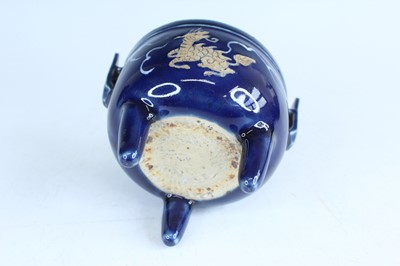 Lot 124 - A Chinese blue-glazed biscuit-relief decorated...