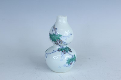 Lot 197 - A small Chinese doucai gourd vase, Yongzheng...