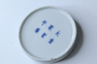 Lot 162 - A small Chinese blue and white ‘figural’ box...
