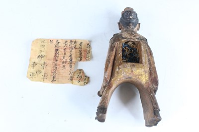 Lot 45 - A Chinese painted wooden figure of a rider on...