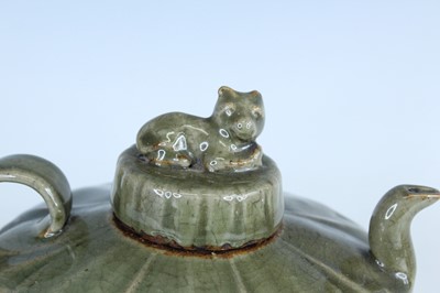 Lot 103 - A Chinese Longquan-type celadon teapot, in...