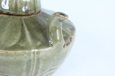 Lot 103 - A Chinese Longquan-type celadon teapot, in...